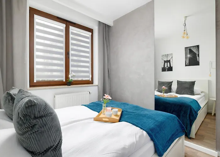 White And Grey In Cracow With Parking By Renters Apartman